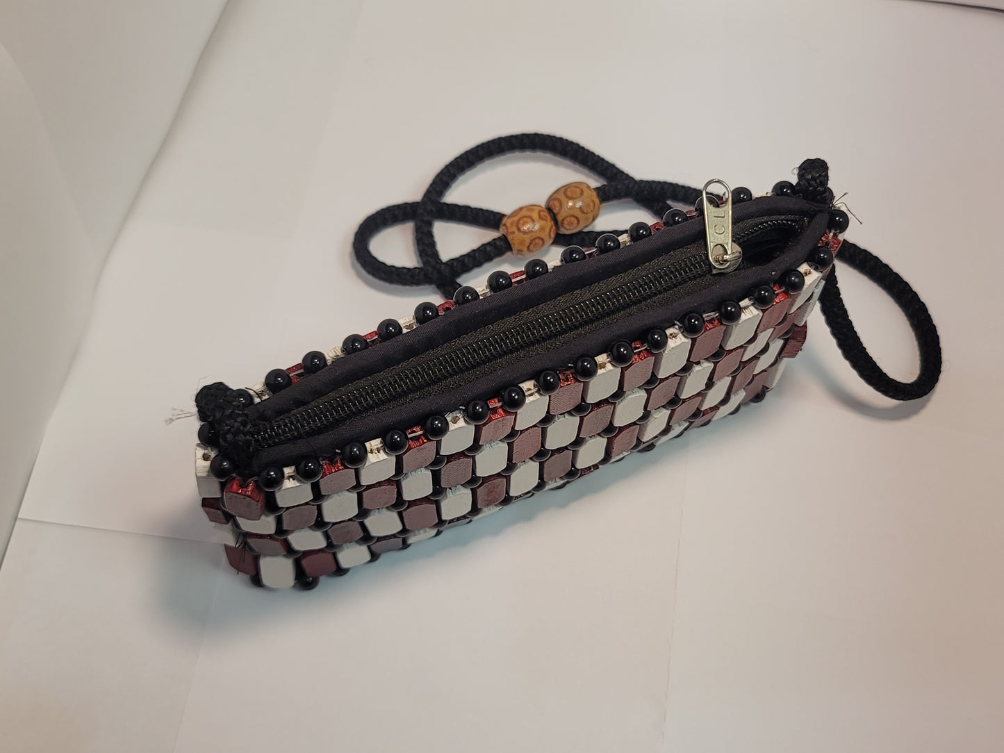 African women's wood art purse